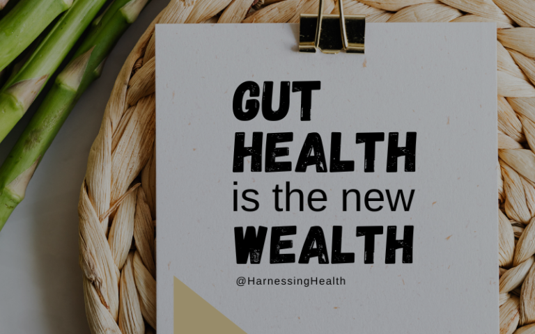 Fermented foods rich in probiotics for better gut health including kimchi, yogurt, sauerkraut, and pickles on a wooden table